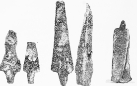 No. 252.   No. 253.   No. 254.   No. 255.   No. 256.

Trojan Lance-Heads of Copper.&mdash;TR.

No. 256. Copper Lance and Battle-Axe welded together by the
Conflagration. The Pin-hole of the Lance is visible.&mdash;TR.